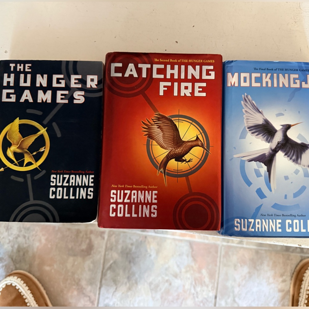 The Hunger Games Trilogy by — Blue, Red, Light Blue Covers